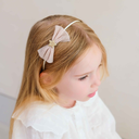 192086-32_TUTU_BOW_HEADBAND_3_5c4dcaea-3213-4001-9842-23eb73f4a369_1800x1800.webp